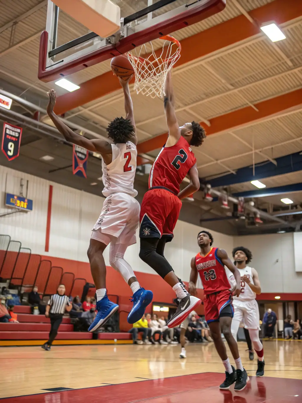 Image of students participating in a volleyball match, highlighting the excitement and competitive spirit of the sport.